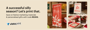 Vistaprint promotional banner with the headline ‘A successful silly season? Let’s print that.’ The ad features festive restaurant marketing materials including a red vertical banner, a tabletop sign, and printed menus. It encourages saving on marketing materials and personalised gifts with code RCA10.